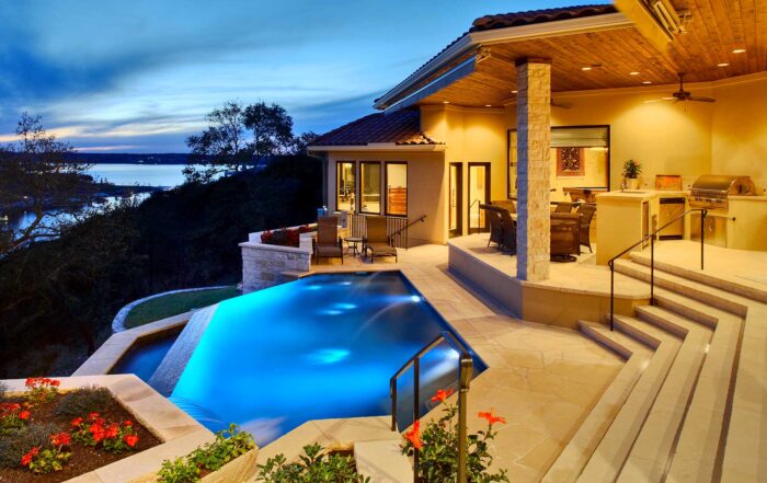 Texas Traditional 5988 - Negative Edge Pool with Open Covered Outdoor Kitchen & Patio with a View of the Lake