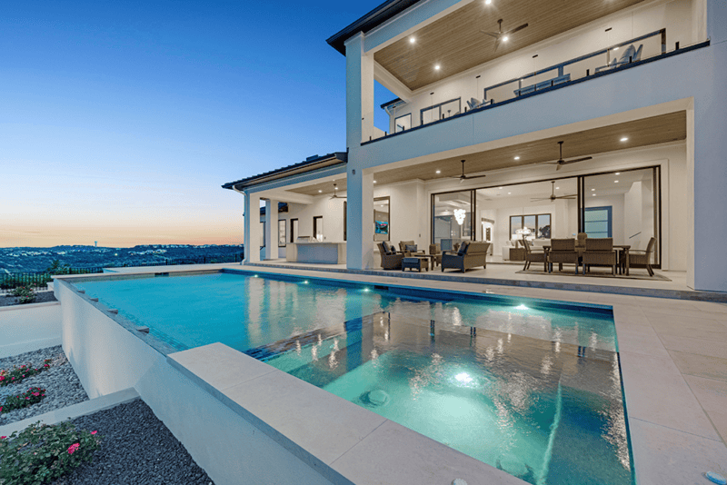 Backyard of a Sterling Custom home. Featuring a resort-style pool. 